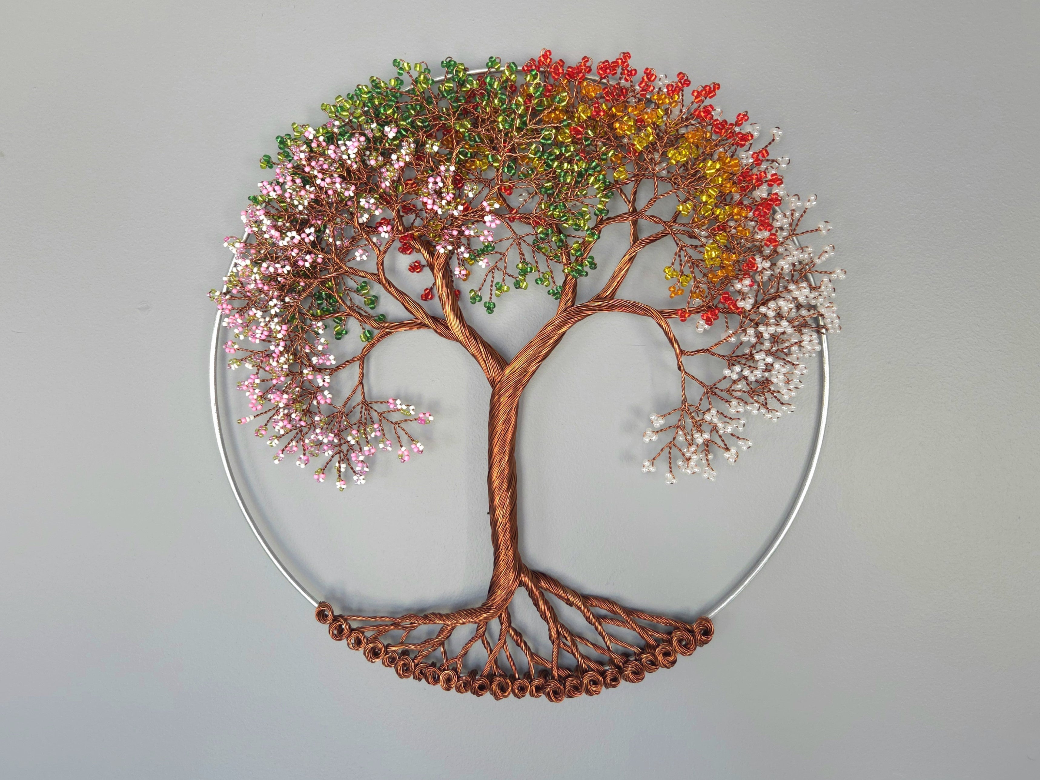 Decorative wall art of a tree on a gray background