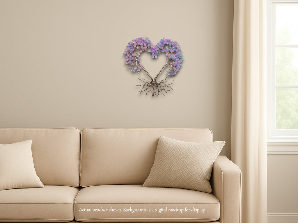 Heart-shaped decorative wall piece above a beige sofa with light-colored walls and window.