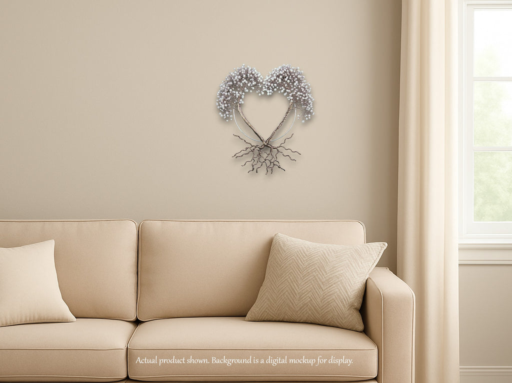 Beige sofa with decorative pillows in a room with a heart-shaped wall art piece.