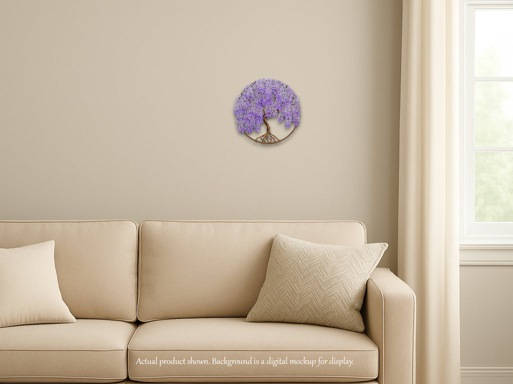 Beige sofa with decorative pillows against a beige wall with a purple wall art piece.