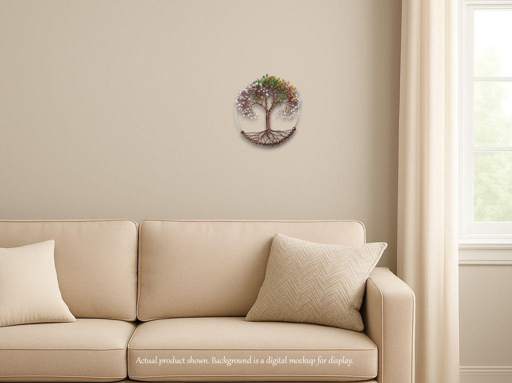 Decorative wall clock on a beige wall above a beige sofa with pillows.
