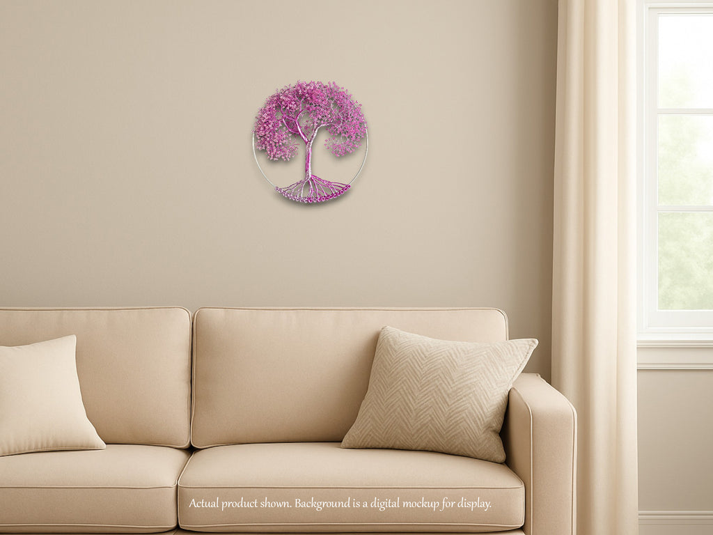 Decorative wall clock shaped like a tree with purple leaves on a beige wall above a beige sofa.