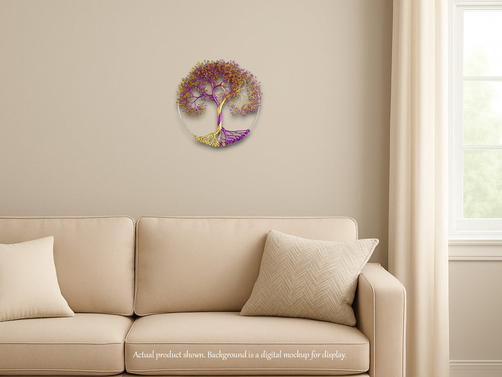 Decorative wall clock with a tree design on a beige wall above a beige sofa.