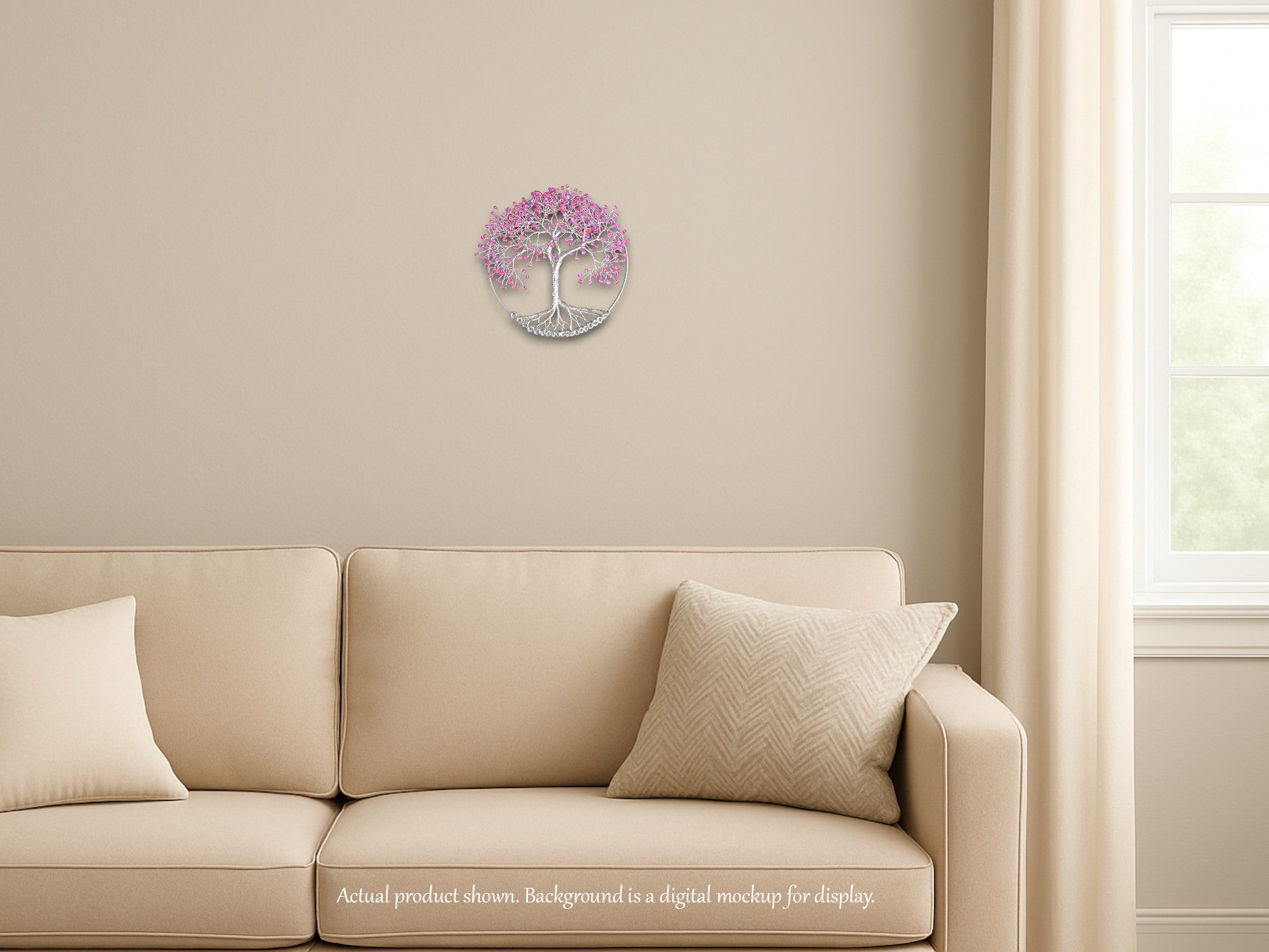 Decorative wall clock with tree design on a beige wall above a beige sofa.