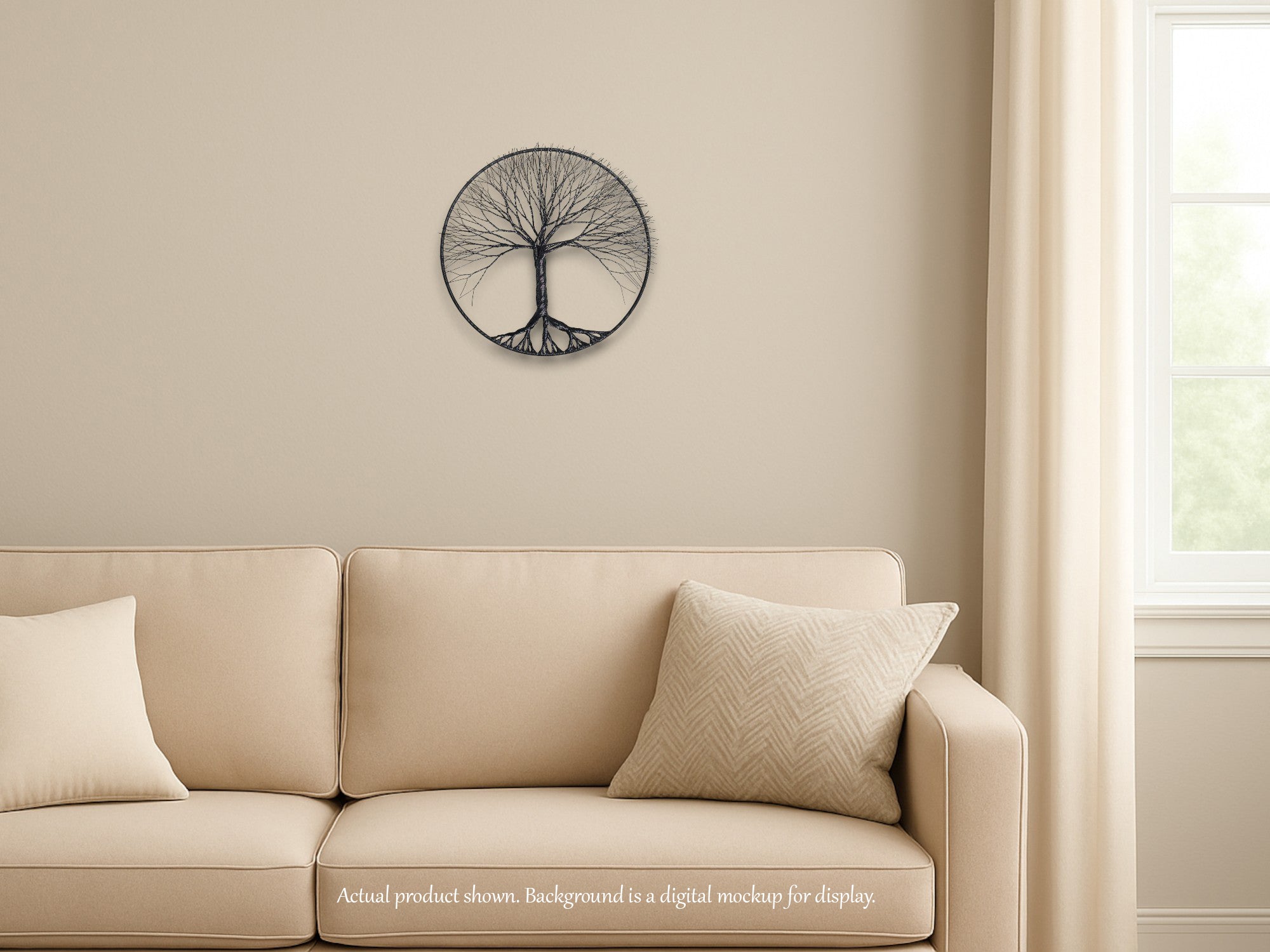 Beige sofa with decorative pillows against a beige wall with a tree wall art piece.