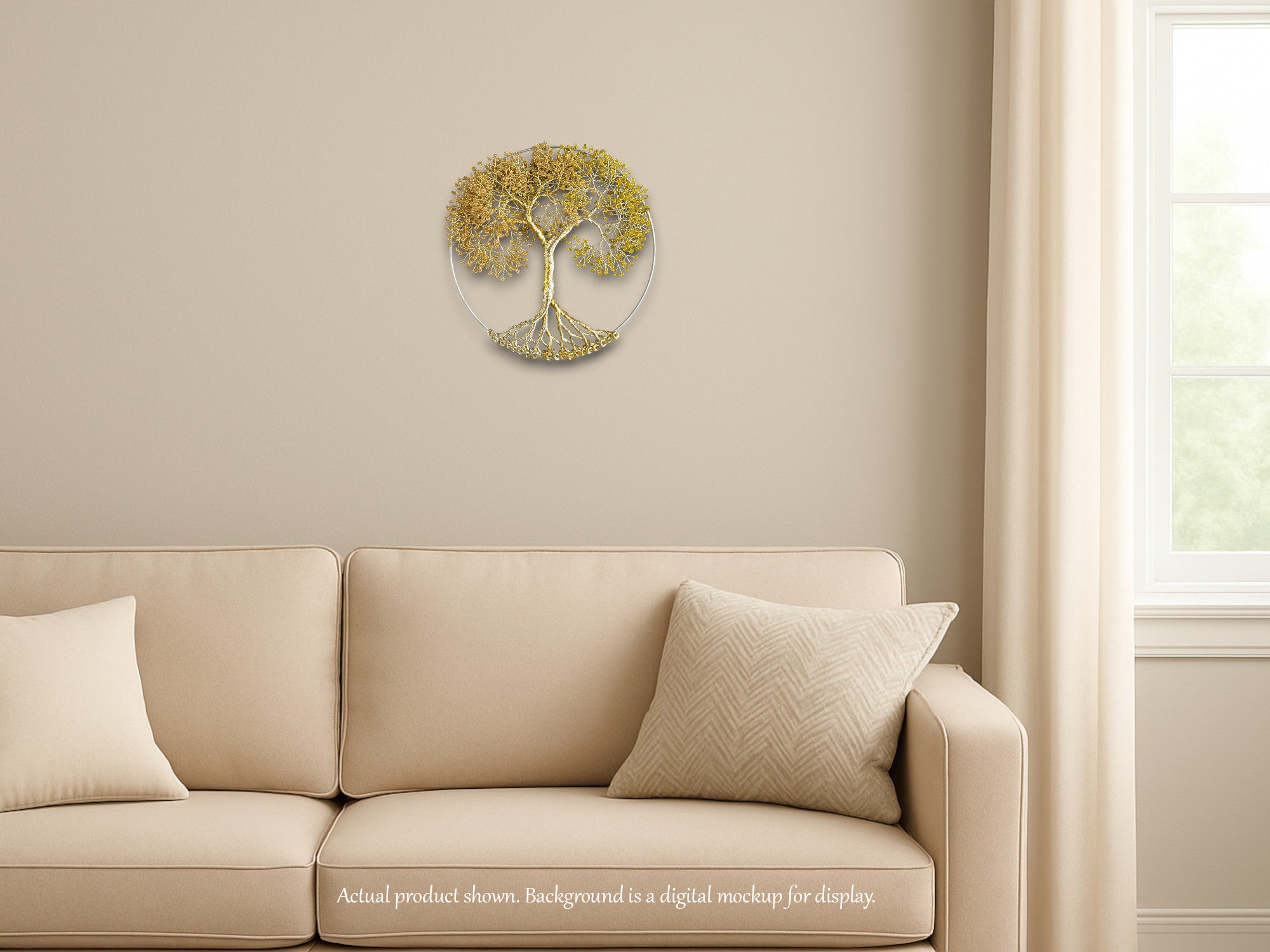 Beige sofa with decorative pillows against a beige wall with a tree wall art piece.